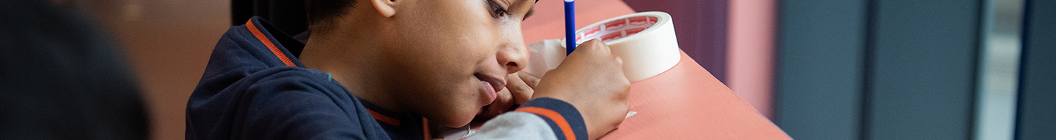 Boy doing a written test